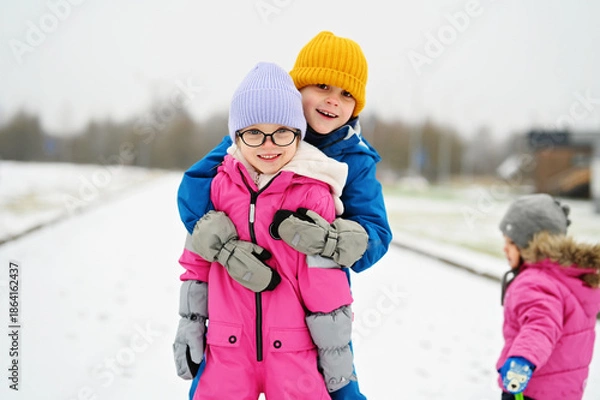 Obraz three siblings on winter day