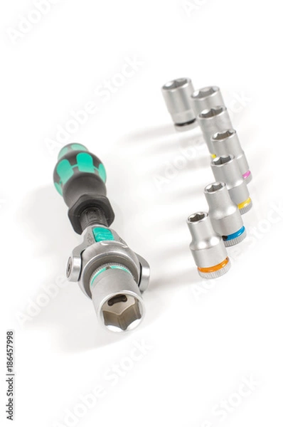 Fototapeta Socket wrench with various bits on the white background