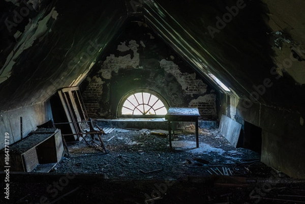 Obraz Abandoned attic room with arched window