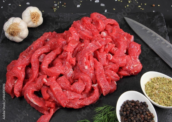 Fototapeta Beef Stroganoff on the Black Background