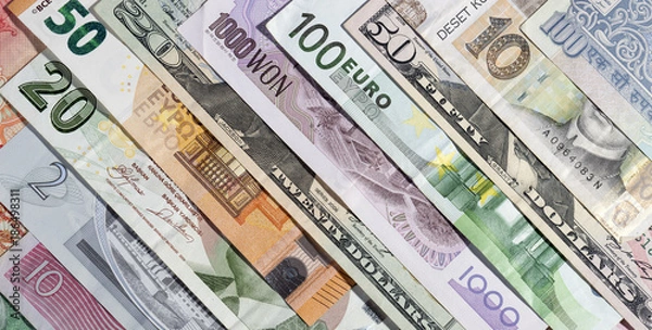 Fototapeta Banknoty różnych walut.