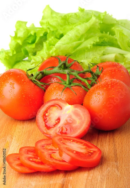Fototapeta Ripe red tomatoes with lettuce
