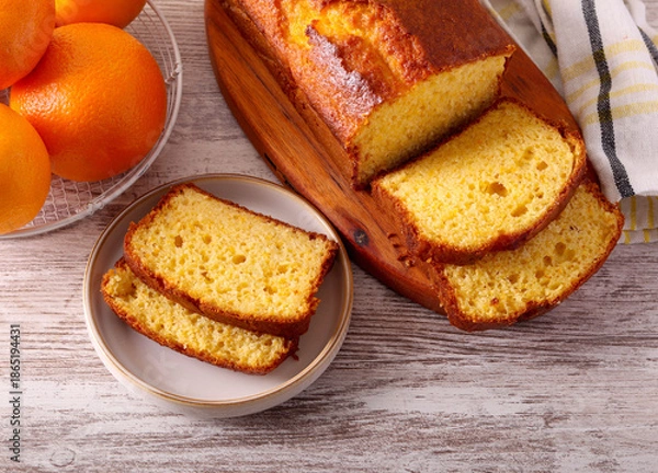 Obraz orange cake, sliced and served