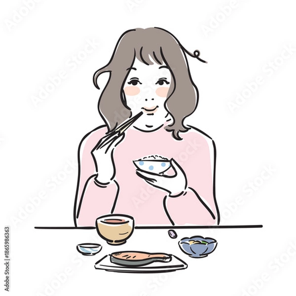 Obraz 朝ごはんを食べる可愛い女性　和食