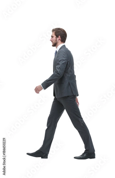 Fototapeta side view. businessman goes forward.