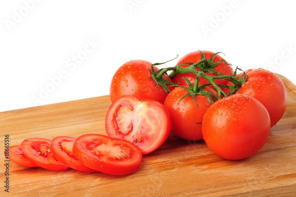 Obraz Ripe red tomatoes on white background.
