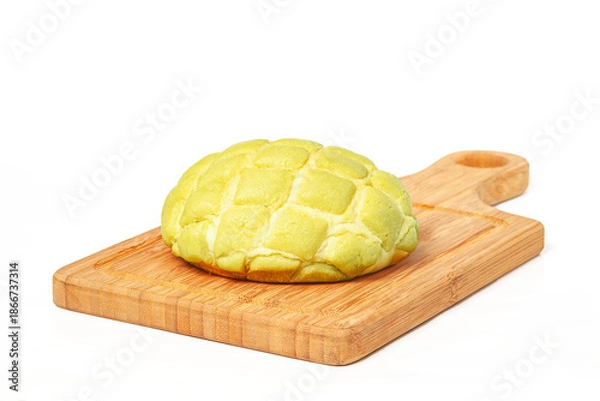 Obraz Cantaloupe-flavored pineapple bread on white background