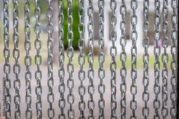 Obraz Big chain curtain hanging gray texture background