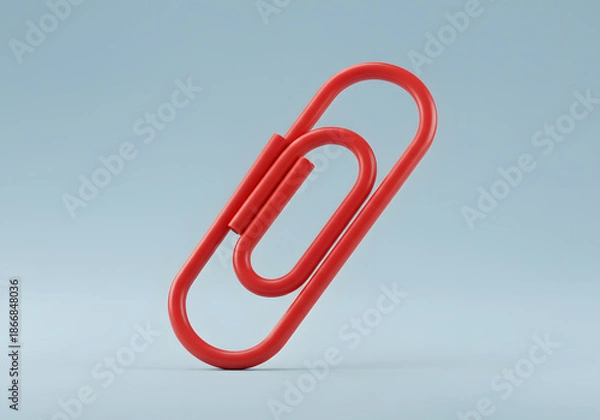 Obraz Red paperclip isolated on light gray background