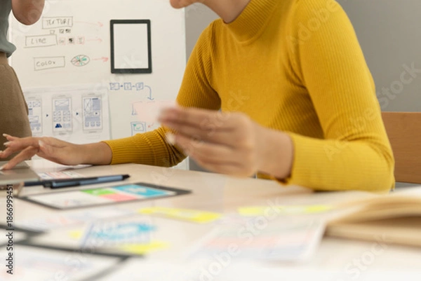 Obraz Creative web designer planning UI application and developing digital template