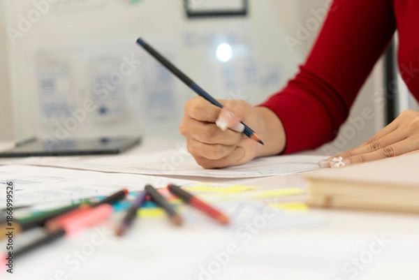 Obraz Creative web designer planning UI application and developing digital template