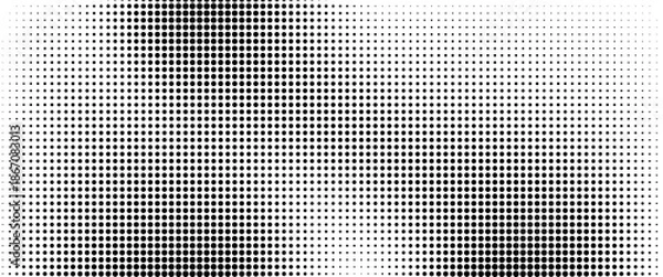 Fototapeta Dotted halftone gradient texture. Fading polka dot background. Repeated dots gradation pattern background.