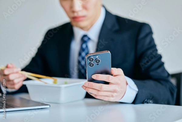 Fototapeta busy multitasking working lunch overworked