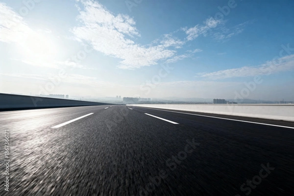 Obraz Empty Highway with Clear Blue Sky and Sunlight