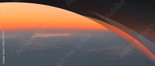 Obraz Sunset over clouds seen from airplane window high resolution image