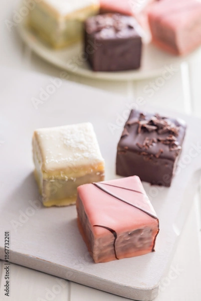 Obraz Sweet dessert cake. Mini pie on white table.