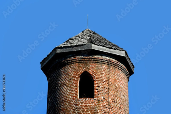 Obraz Brick Tower With Arched Window