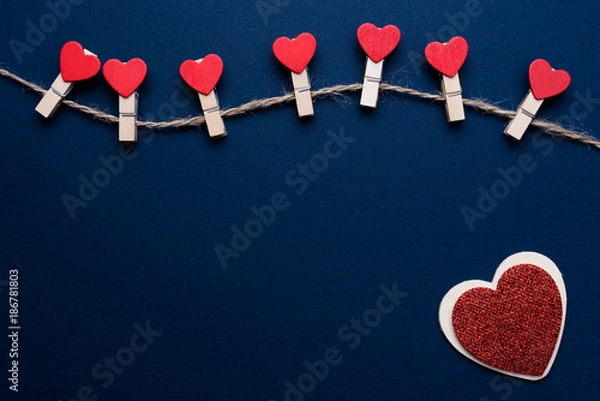 Fototapeta red heart in blue background of valentine day concept and love concept. copy space for text.