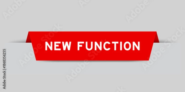 Obraz Red color inserted label with word new function on gray background