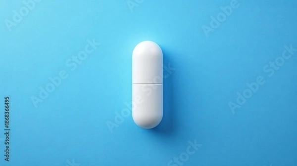 Obraz White capsule on a bright blue background