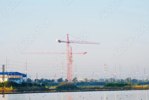 Obraz A crane is used for constructing buildings.