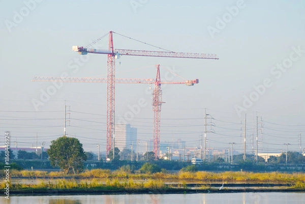 Obraz A crane is used for constructing buildings.