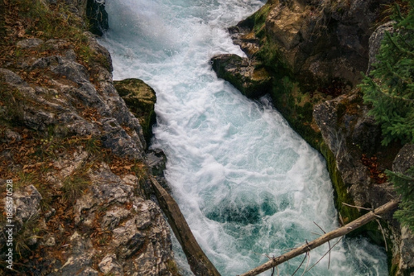 Obraz Mountain stream rushing through rocky canyon