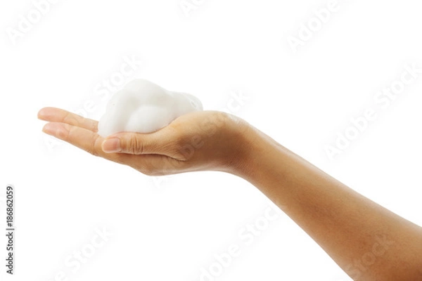 Obraz Female's hand with white foam isolated clipping path.