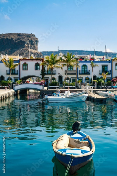 Fototapeta Colourful port with palm trees Puerto De Mogan on Gran Canaria island.