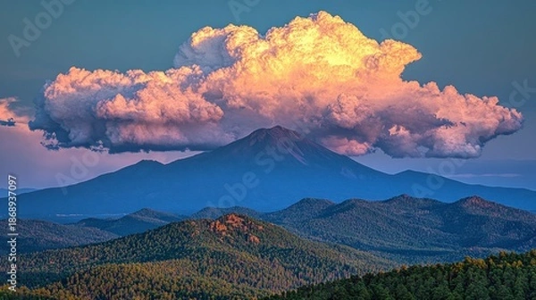 Obraz Mountain range at sunset, large cloud over peak