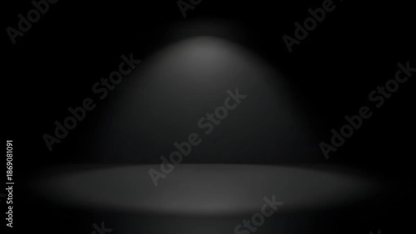 Obraz A single spotlight illuminates a dark empty stage or platform