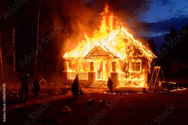 Fototapeta The house is on fire
