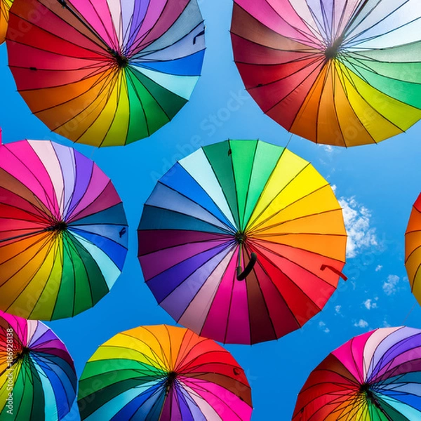 Fototapeta Colorful umbrellas background. The sky of colorful umbrellas