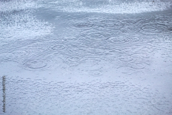 Obraz Winter Rain Falling on Snow Creating Soft Ripples