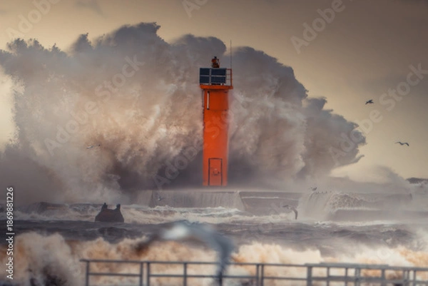 Fototapeta Lighthouse Amidst Violent Ocean Waves