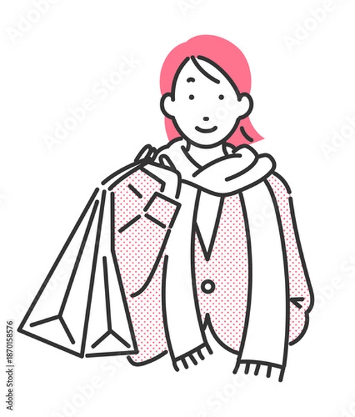 Fototapeta 買い物袋を下げている冬物コーデの女性