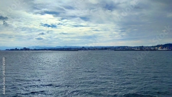 Obraz 桜島と秋の青空を望む鹿児島湾の雄大な絶景
