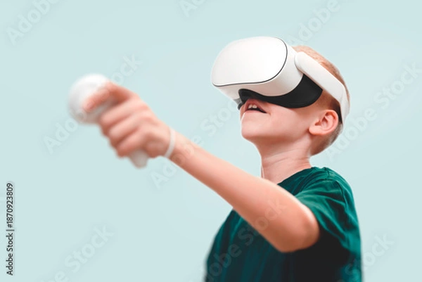 Obraz Young boy using virtual reality VR headset