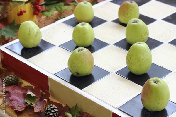 Obraz Apples on chessboard