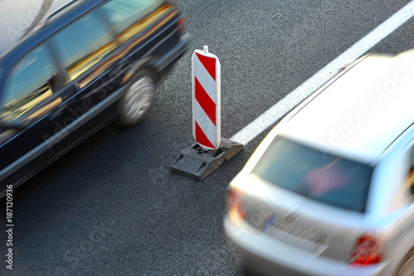 Obraz Moving Cars passing road sign