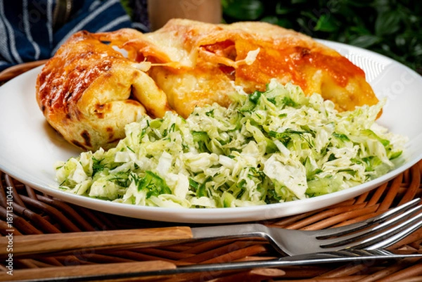 Obraz Stuffed pancake baked with cheese.