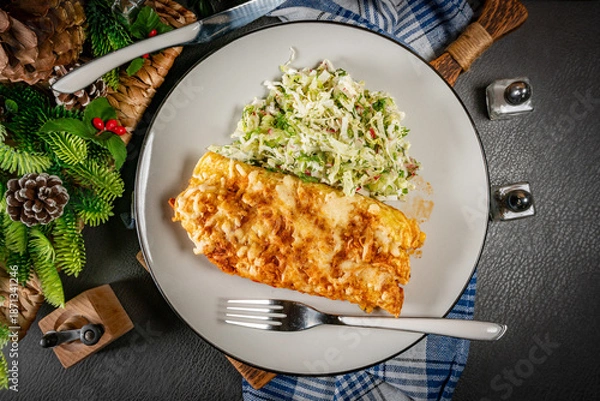 Obraz Stuffed pancake baked with cheese.