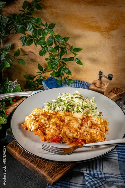 Obraz Stuffed pancake baked with cheese.