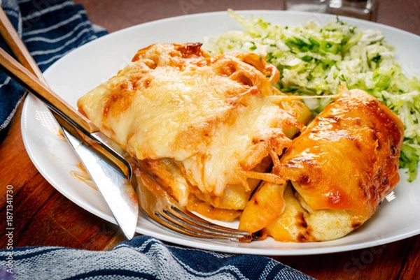 Obraz Stuffed pancake baked with cheese.