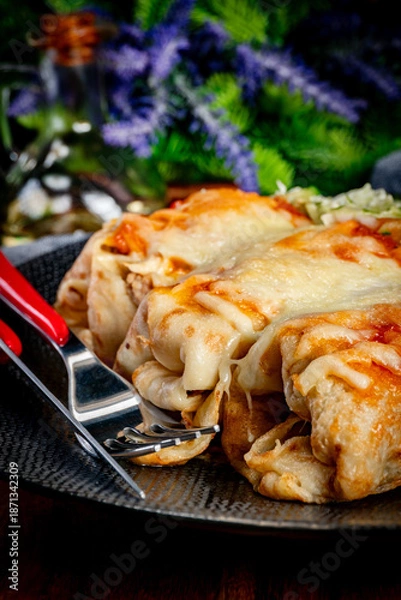 Obraz Stuffed pancake baked with cheese.
