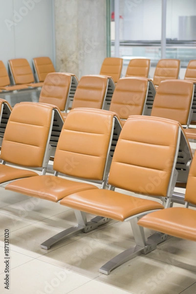 Fototapeta A row of empty seat vintage style in the airport