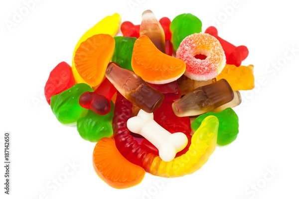 Fototapeta The colored fruit jelly sweets on white background