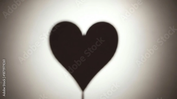 Fototapeta Heart shape shadow on white background
