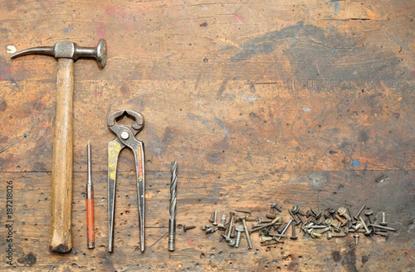 Obraz Old used dirty workbench with tools for background.