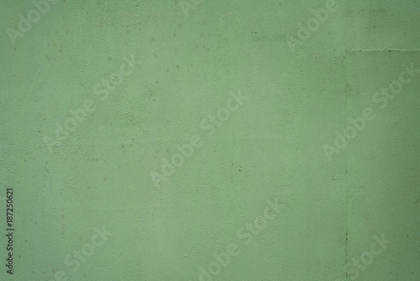 Fototapeta Old iron surface is painted green paint - bright rustic metal background